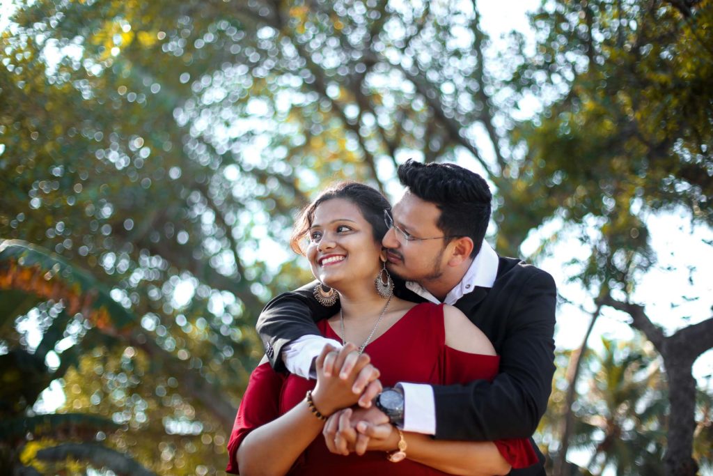 Bride and Groom looking great in a Solid Maroon and Navy Combination for their post wedding photoshoot