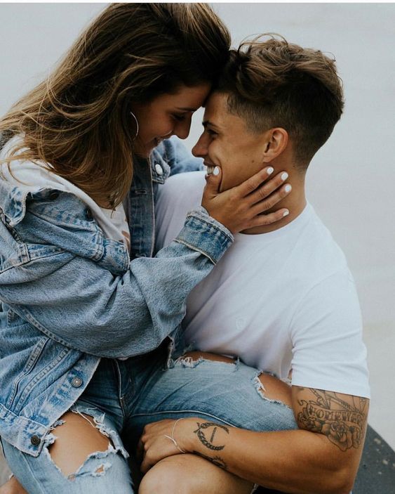 Couple wearing a White and Denim combo for their photoshoot